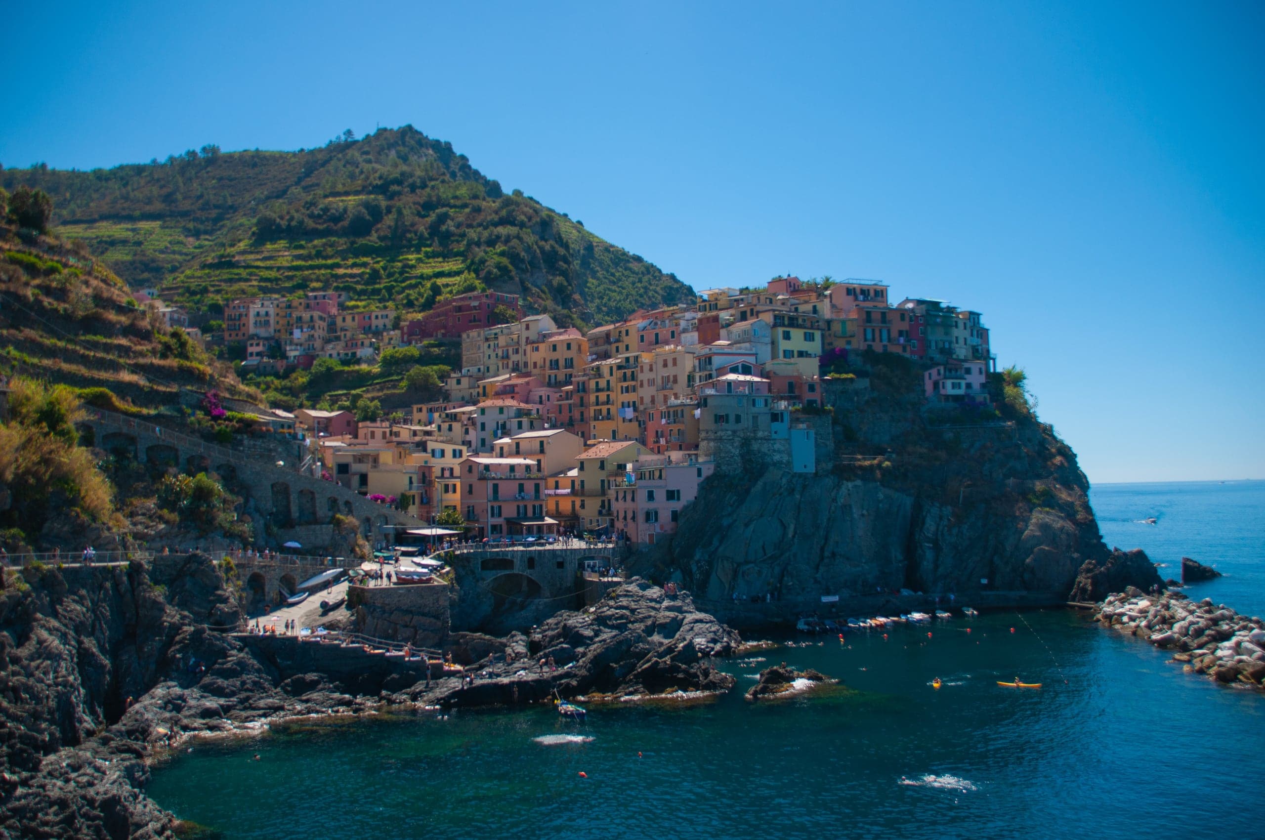Colorful Manarola clustered on a rocky headland above the Ligurian Sea
