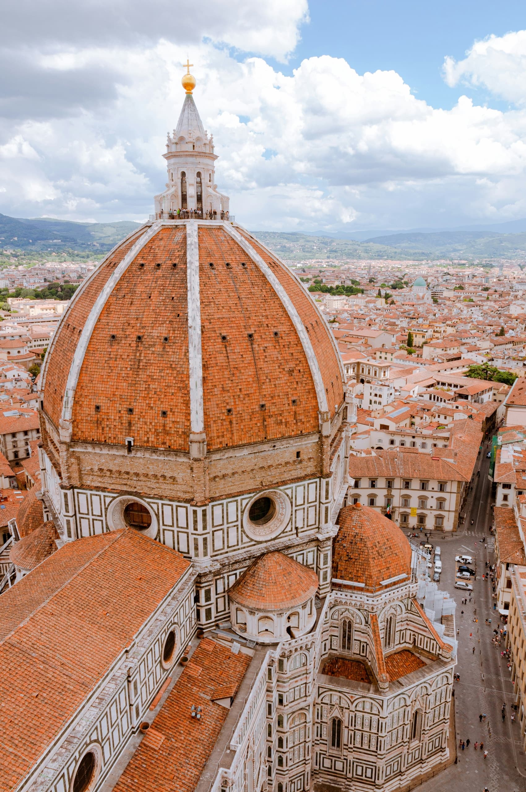 The Florence skyline and cathedral framed by the green Tuscan hills
