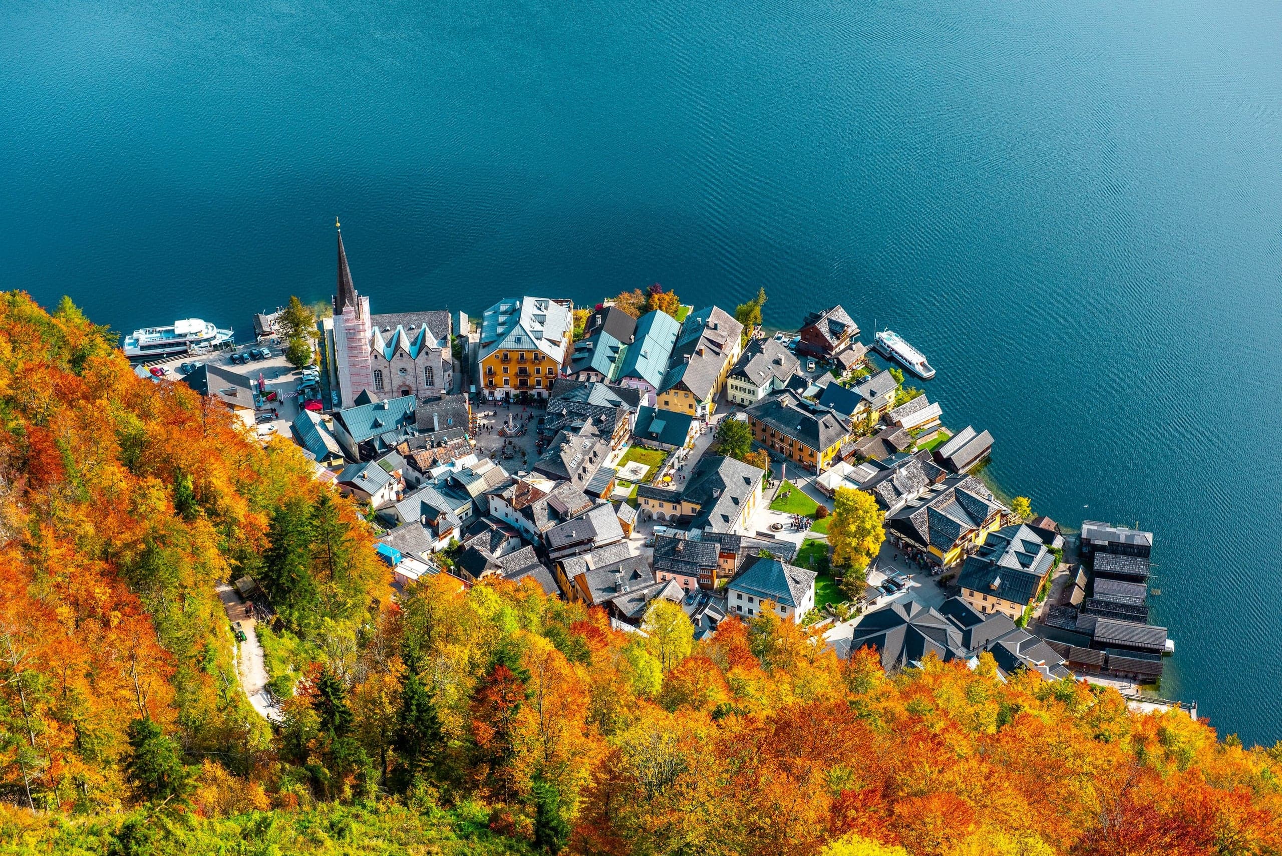 Hallstatt village center and waterfront from above in autumn
