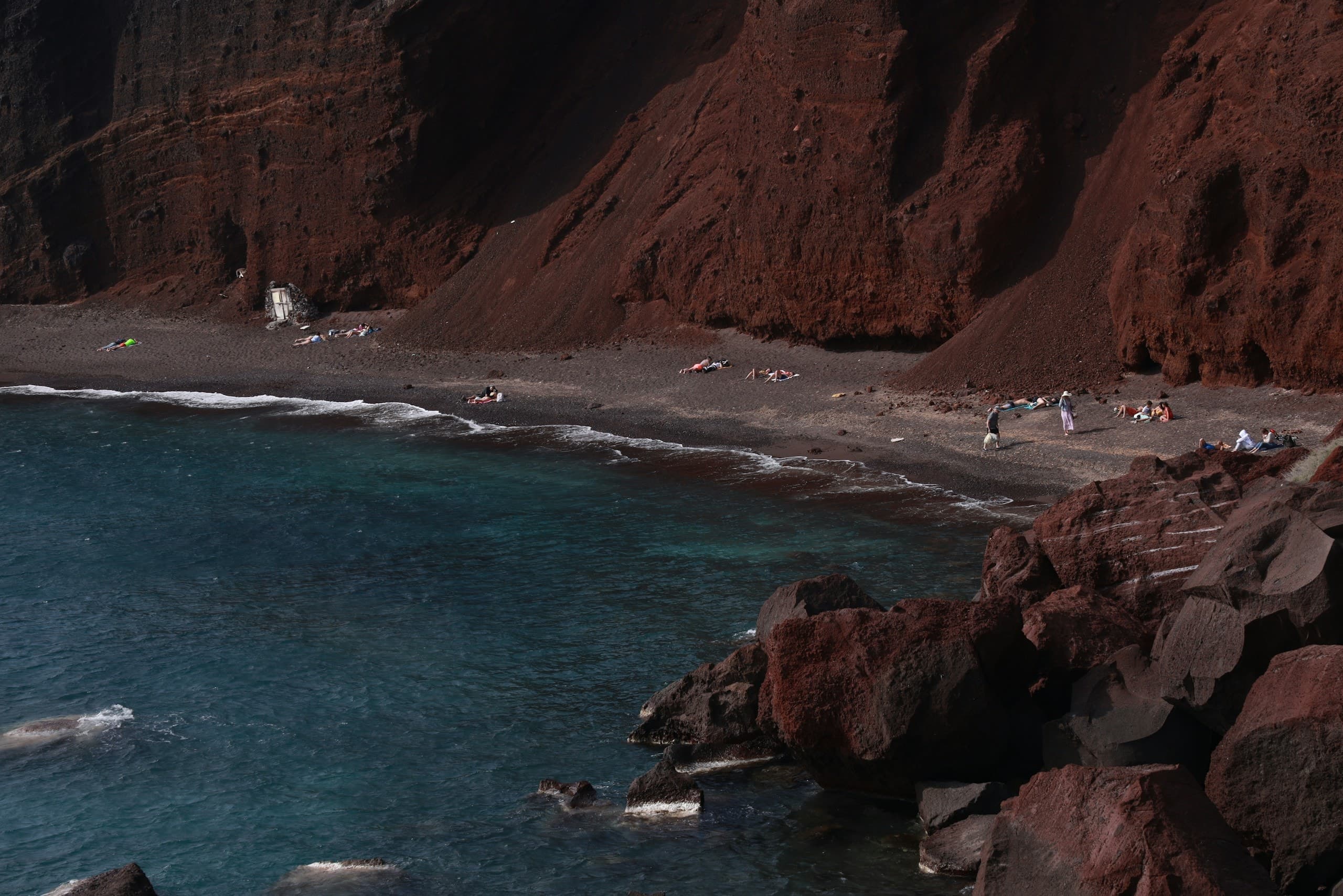 a group of people on a beach