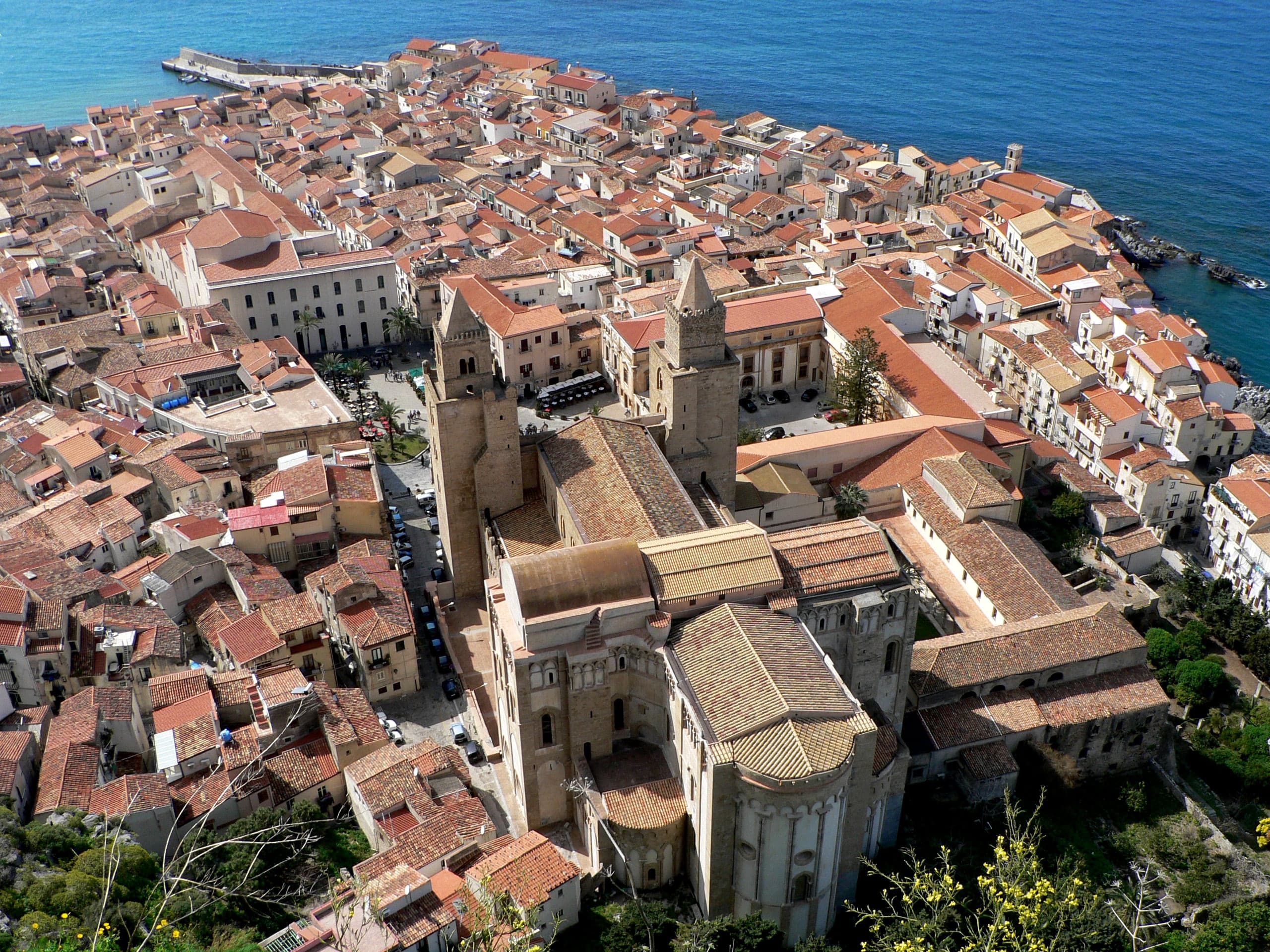 Cefalù's terracotta old town meeting the blue Tyrrhenian Sea