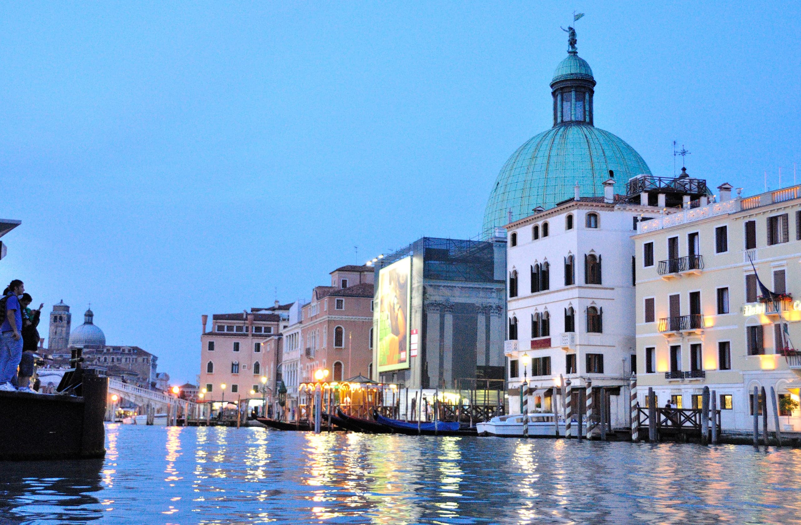 Domed church and waterfront palazzi reflected in the Venetian lagoon